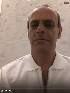 מ
