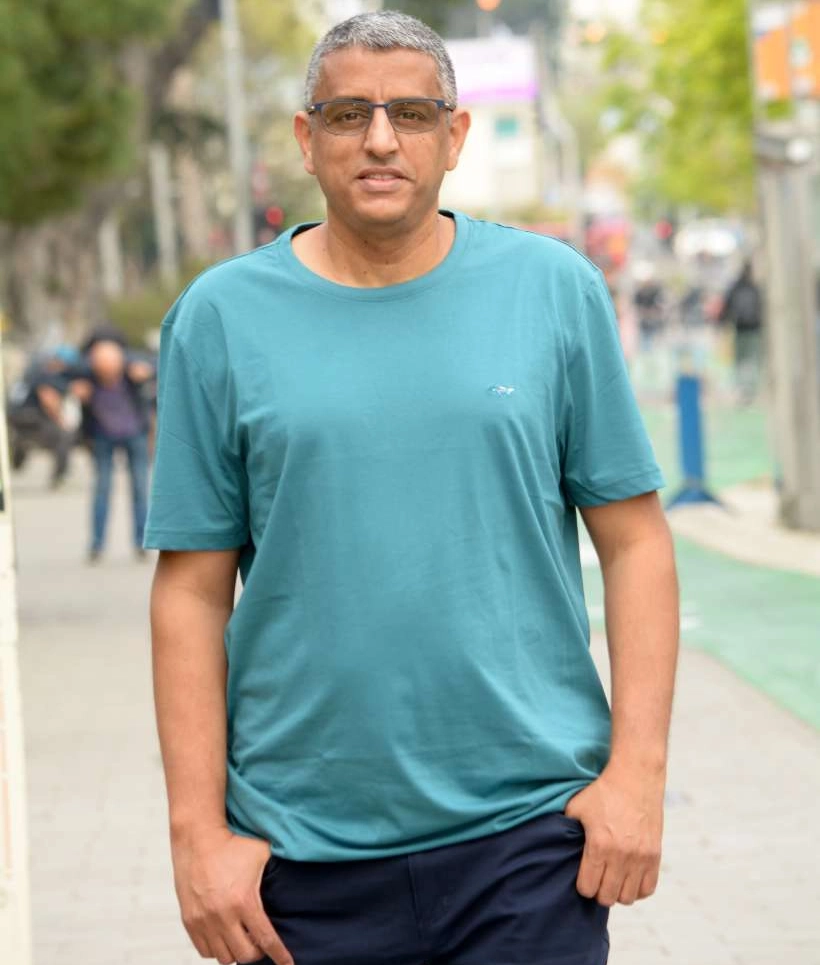 טל